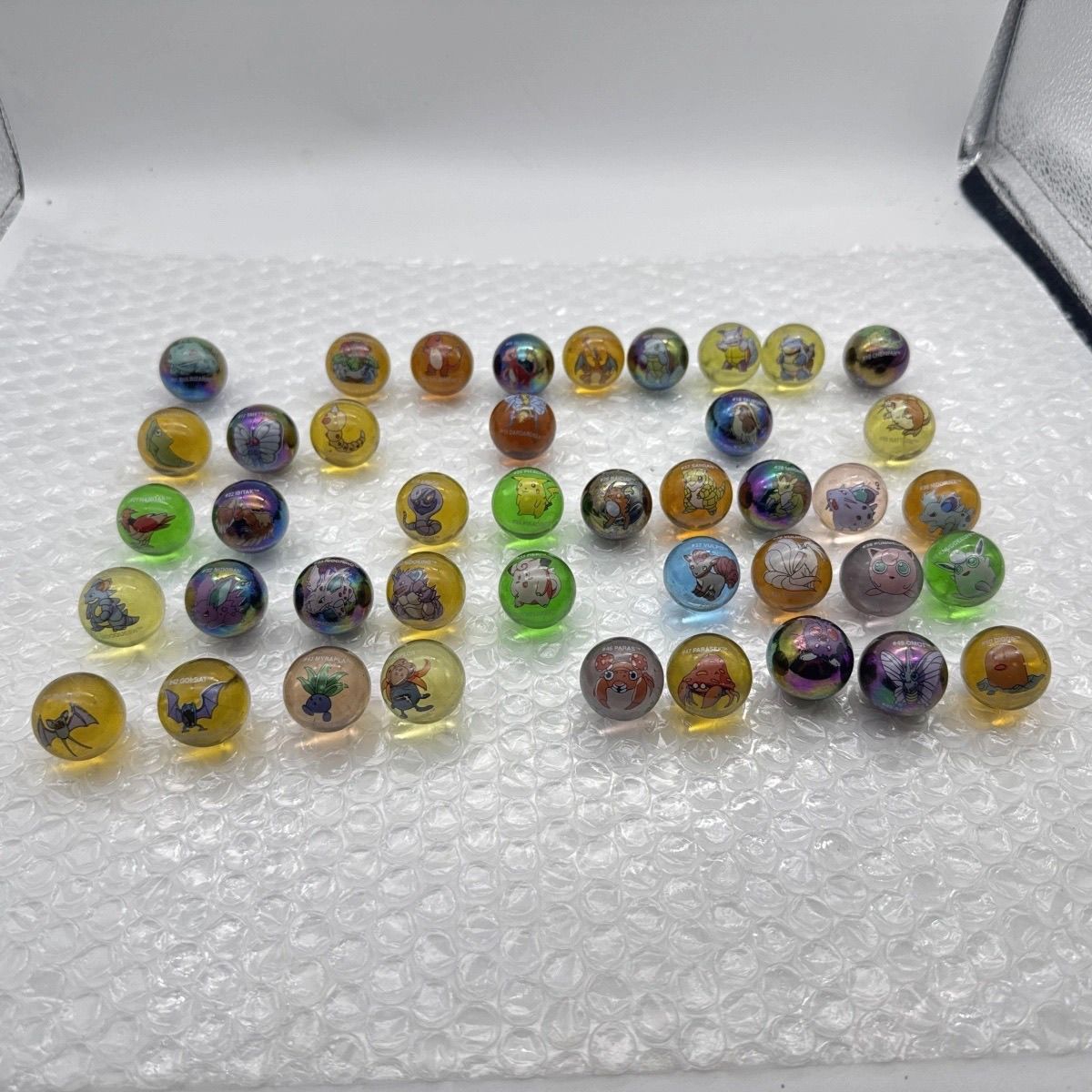 Merchandise Oficial Pokémon, B - Vintage Collectible Marbles avaliação e preço